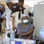 Travailleurs sanitaires en tenue de protection lors d’une riposte Ebola